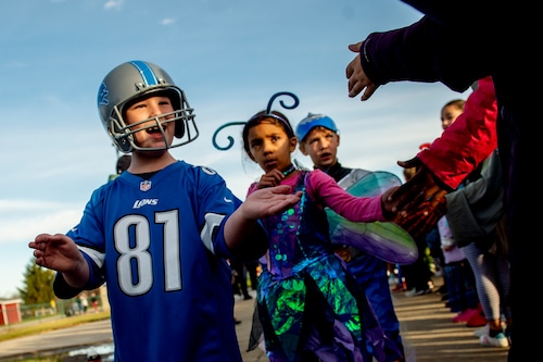 400 Grand Blanc elementary students parade in Halloween costumes